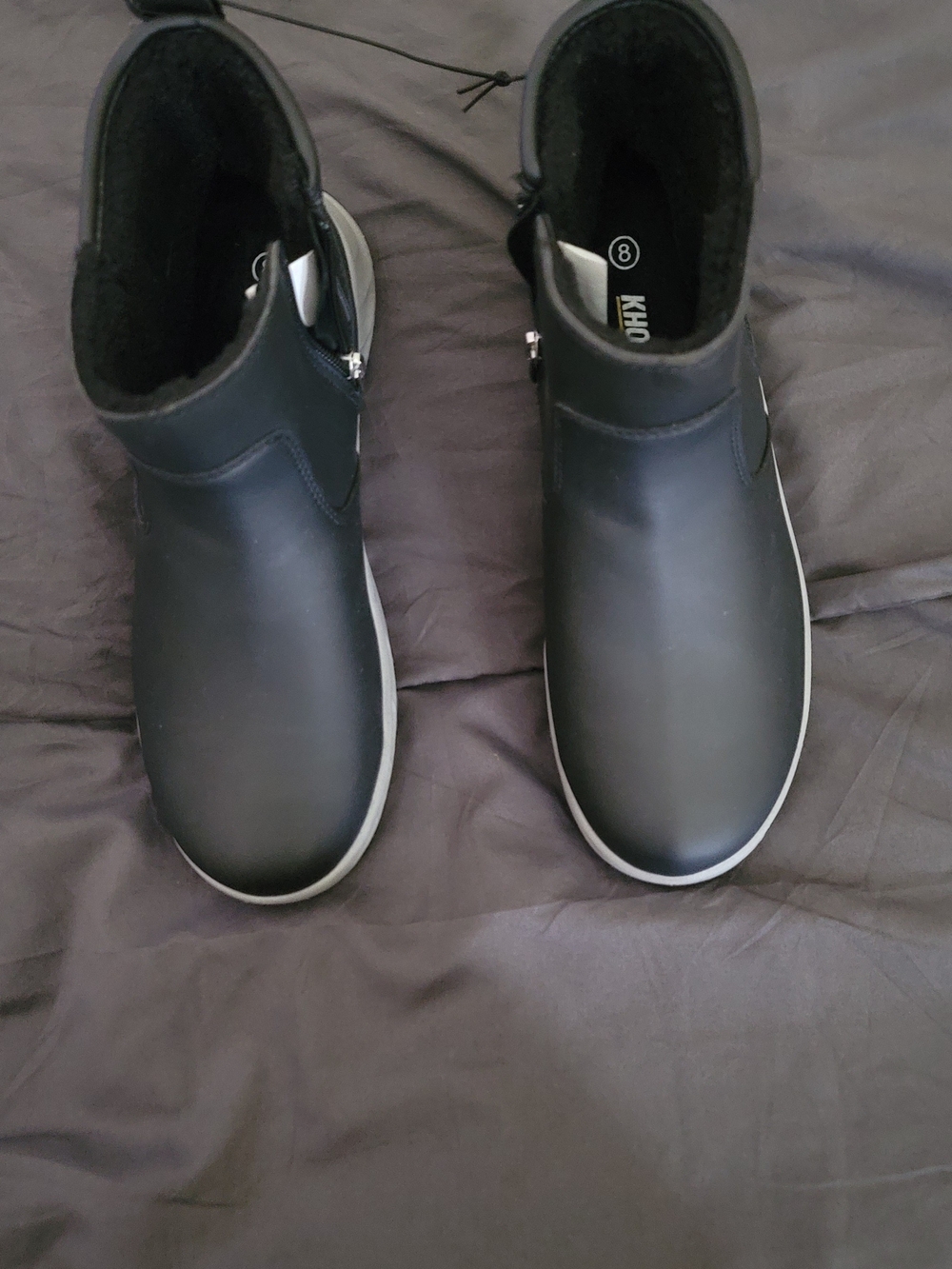 Khombu Black Ankle Booties with Contrast Sole